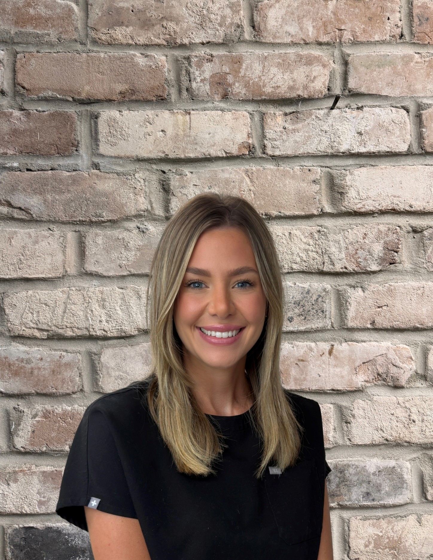 Ashley, clinical team member at Baton Rouge Oral and Facial Surgery & Dental Implant Center